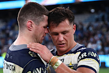 John Bateman consoles Scott Drinkwater after his error-riddled performance in North Queensland’s elimination final loss to Cronulla.