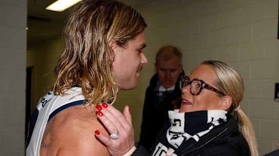 In-form Cat Bailey Smith with his mum Sinead in the Geelong rooms after Saturday’s win.