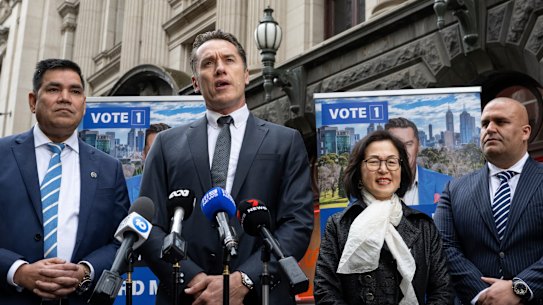 Koutoufides on Saturday with ticket members (from left) Intaj Khan, Gladys Liu and Zaim Ramani.