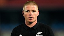 New Zealand’s Anton Segner watches on.