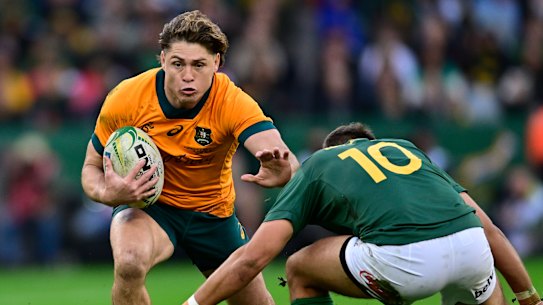 James O’Connor looks for a gap in the field.