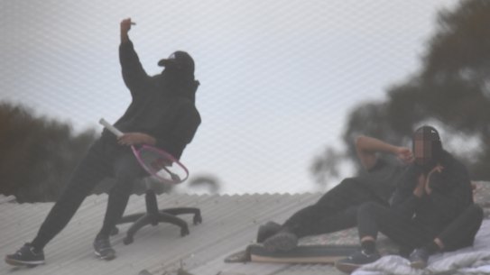 Detainees are seen during a riot at the Frank Baxter Juvenile Justice Centre, Kariong, on Monday.