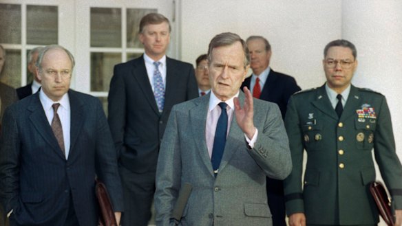 President George HW Bush, centre, pictured in 1991 in the Rose Garden of the White House with, from left, Defence Secretary Dick Cheney, Vice President Dan Quayle, White House Chief of Staff John Sununu,  Secretary of State James A Baker III, and Joint Chiefs Chairman General Colin Powell. 
