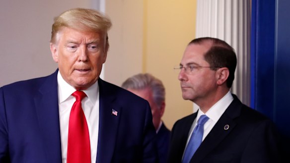 Donald Trump and Health and Human Services Secretary Alex Azar last month.