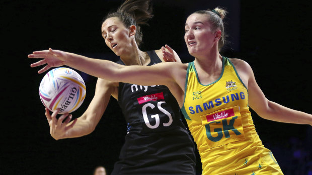 New Zealand's Bailey Mes and Australia's Courtney Bruce.