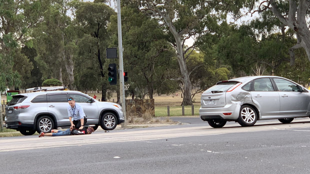 A woman is arrested after a stolen car crashed into a silver Ford Focus.