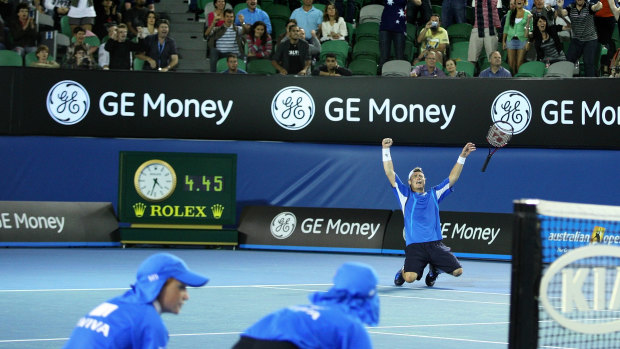 Lleyton Hewitt celebrates victory over Marcus Baghdatis after close to five hours on court in 2008.