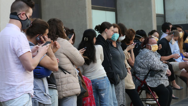 People line up outside the Royal Melbourne Hospital for coronavirus testing earlier this month.