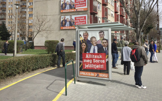 A billboard from Prime Minister Viktor Orban's Fidesz party reads "Let's stop Soros' candidates!" 