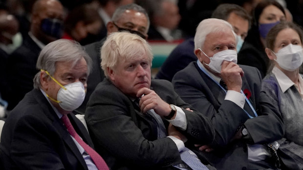 UN Secretary-General Antonio Guterres, left, and, from left, British Prime Minister Boris Johnson and British broadcaster and naturalist Sir David Attenborough, aged 95, listen during the opening ceremony of the COP26.