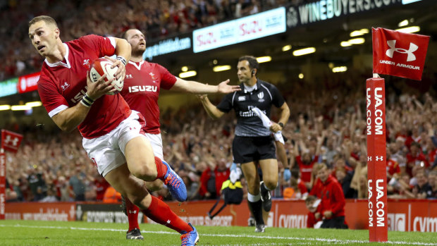 George North scores the first try for Wales at the Principality Stadium, in Cardiff.