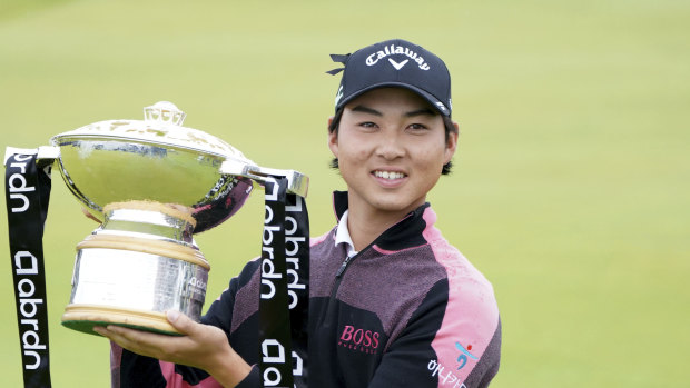 Australia’s Min Woo Lee holds the trophy after winning the Scottish Open at The Renaissance Club.