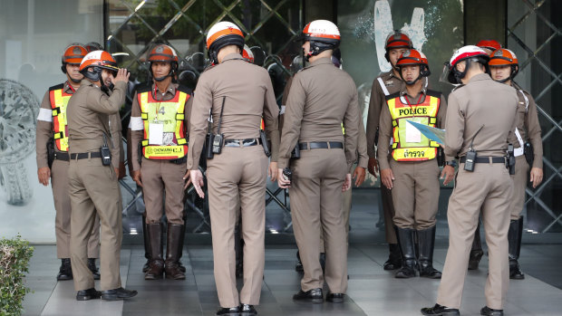 Traffic police gather outside the venue hosting the ASEAN meeting in Bangkok.