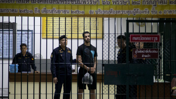 Hakeem al-Araibi waits to transferred to a jail in a court house in Bangkok. It's been revealed that it was Australia that tipped off Thai authorities to his arrival.