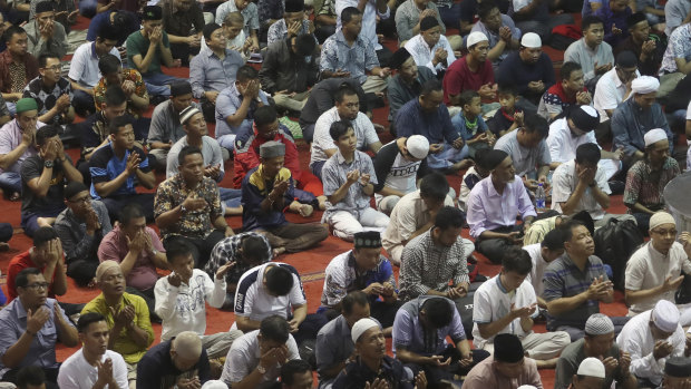 People gather for Friday prayers at the Istiqlal Mosque in Jakarta, Indonesia, on February 14.