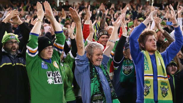 Raiders fans start the Viking clap, which will get a run during the grand final, begun by Mal Meninga blowing the horn.