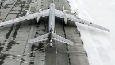 A Tu-95 bomber at a Russian airbase. Russia has intensified its military drills.