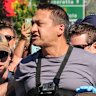 Dezi Freeman, pictured at a protest in Myrtleford, was shot dead by police on Monday after months on the run.