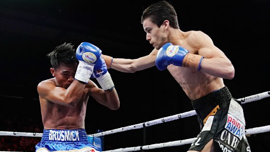 Gloves up: Brock Jarvis (right) goes on the offensive against Ernesto Saulong during the 'Battle of Bendigo' bout.