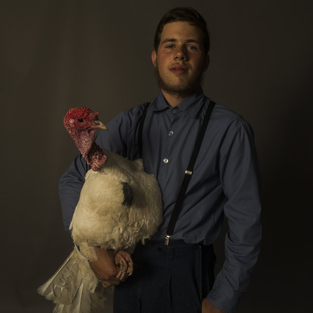 John, 14, with Mr Puffy Pants the turkey.