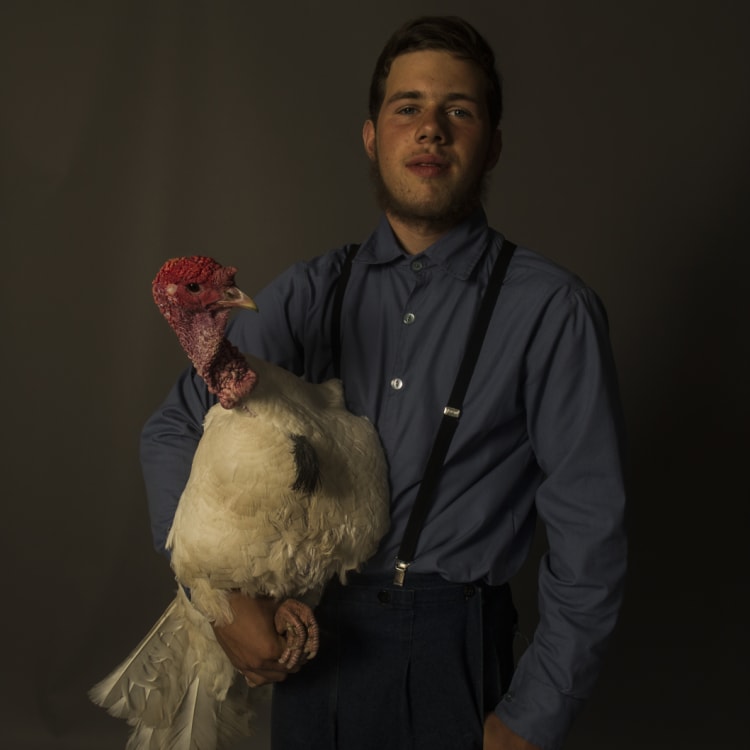 John, 14, with Mr Puffy Pants the turkey.