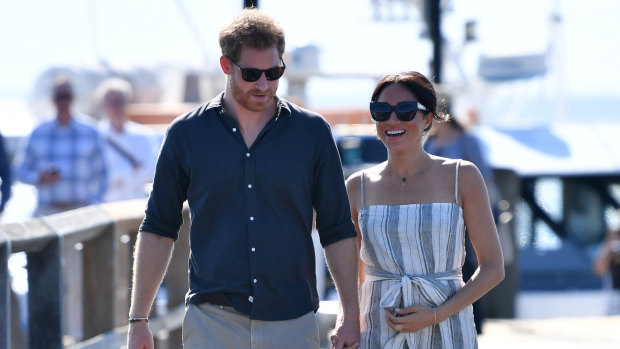 Prince Harry and his wife Meghan on Kingfisher Bay Jetty on Fraser Island on Monday.