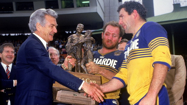 Mick Cronin and Ray Price accept the Winfield Cup from Prime Minister Bob Hawke in 1986.