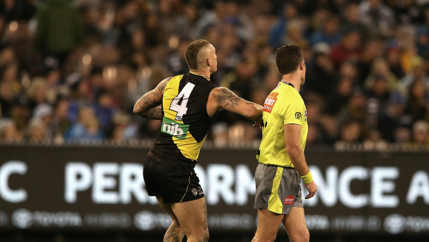 Dustin Martin's contact with umpire Jacob Mollison was ruled as careless.