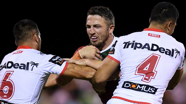 Worrying signs: Sam Burgess is tackled by Corey Norman and Timoteo Lafai.