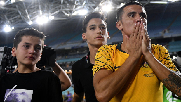 End of an era: Tim Cahill gestures to supporters following his final game.