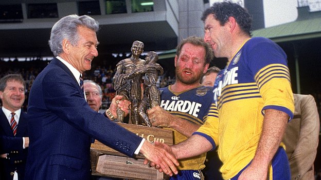 Australian Prime Minister Bob Hawke congratulates Mick Cronin (right) and Ray Price after their 1986 NSWRL grand final win.
