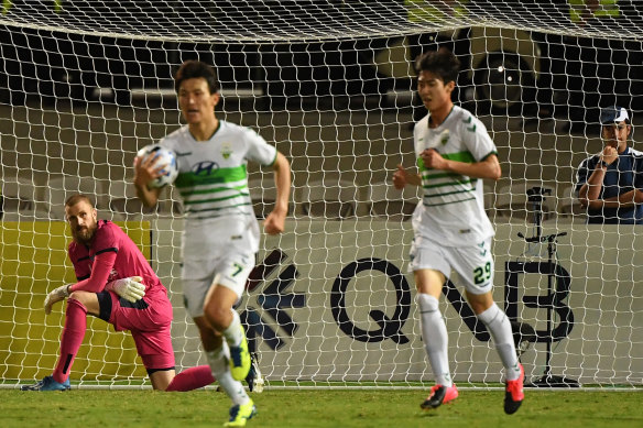 Sydney FC goalkeeper Andrew Redmayne looks on after Han Kyo-won's late equaliser on Wednesday night.