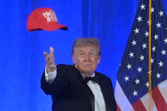 Trump tossed his “Trump 2028” cap to the crowd following his poorly received speech.