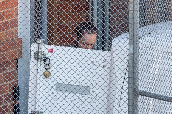 Brendan Nugent is led away from court.