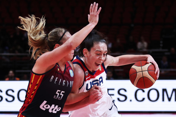 American superstar Breanna Stewart (right) is challenged by Belgium’s Julie Allemand.