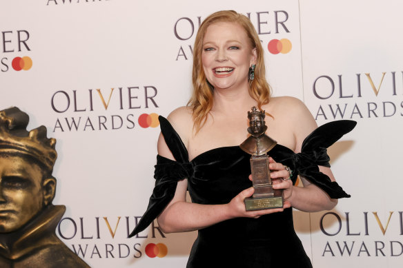 Sarah Snook, winner of the best actress award for “The Picture Of Dorian Gray”, poses for photographers in the winner’s room during the Olivier Awards.