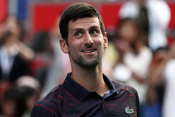 Novak Djokovic celebrates victory over Australia's Alexei Popyrin.