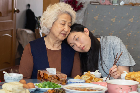 Globe hopeful: Awkwafina playing the granddaughter to her dying grandmother (Zhao Shuzhen) in The Farewell. 