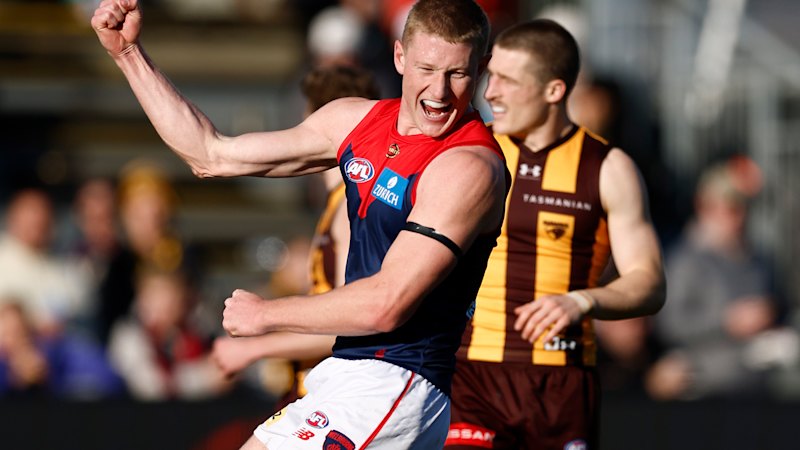 AFL LIVE: Hawks eat 10 goals out of the deficit but Dees get the last laugh in Tassie; Pies superstar a late out; Freo’s streak in huge strife