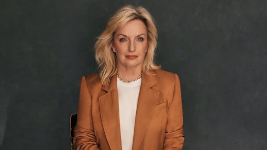 Christine wears Ginger & Smart jacket and pants, her own blouse, Saint Laurent shoes, and David Yurman jewellery.