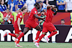 Cyle Larin celebrates his goal.