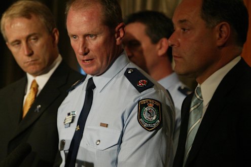 Then police minister Carl Scully (left) with assistant police commissioner Mark Goodwin and premier Morris Iemma on December 12, 2005.
