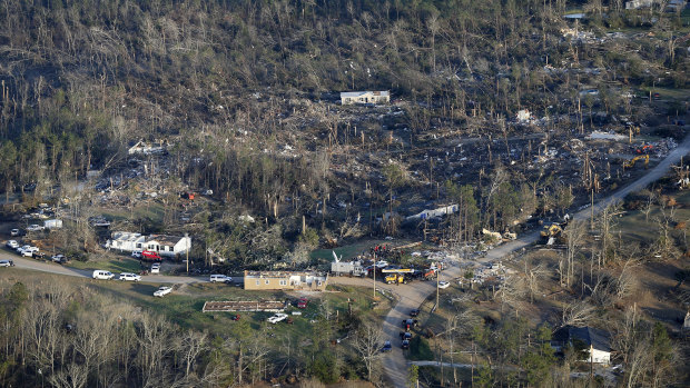 Destruction is seen from tornadoes that killed multiple people in Lee County, Alabama.