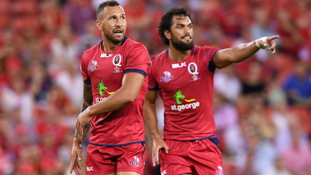 Out in the cold: Reds players Quade Cooper and Karmichael Hunt.