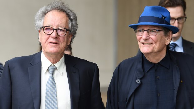 Geoffrey Rush and Fred Schepisi outside the Federal Court on Friday.