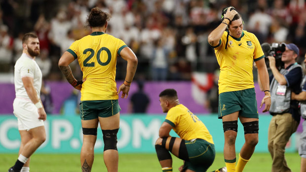 All over: The Wallabies take in defeat.