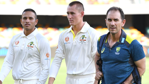 Two into three:  Usman Khawaja and Marnus Labuschagne, pictured with Justin Langer, both hope to bat at first drop. 