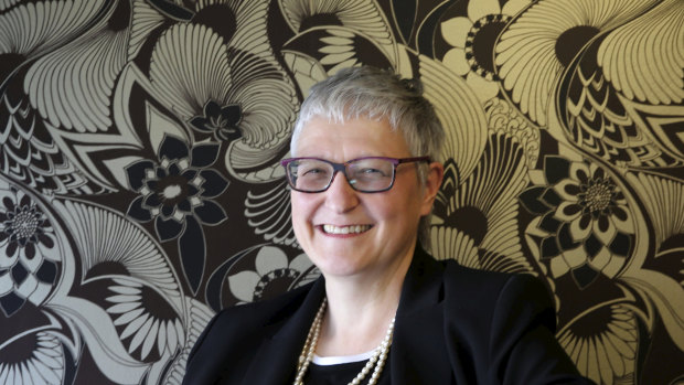 Commonwealth Bank group executive human resources Sian Lewis had to get to university before she could take up cricket and rugby. She has long hung up her bat and boots but is still a fierce advocate for women's sports. 