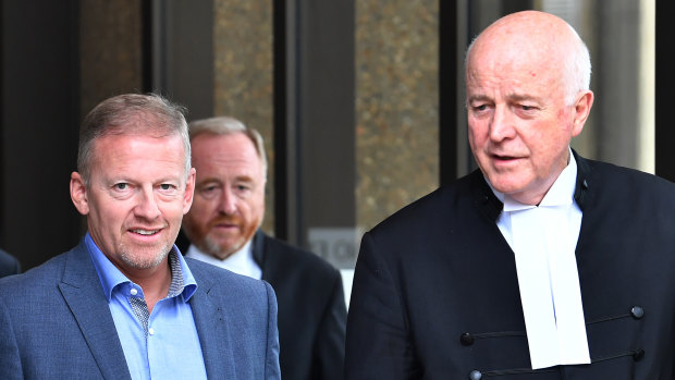 Chris Oliver (left) and Stuart Littlemore QC (right) leave the Federal Court in Sydney on Monday.