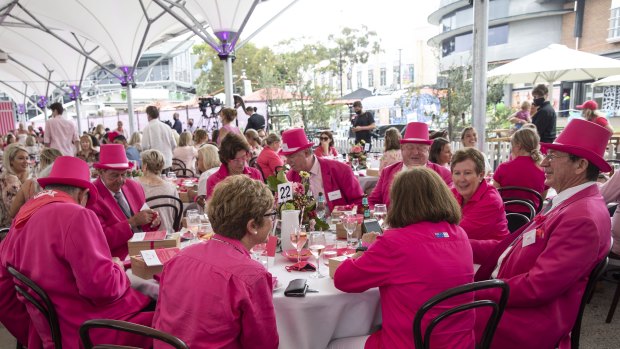 People dressed in pink enjoy the Jane McGrath High Tea on Friday. 